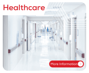 Hospital hallway with white floors and walls, labeled “Healthcare,” and a “More Information” button.