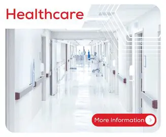 Hospital hallway with white floors and walls, labeled “Healthcare,” and a “More Information” button.