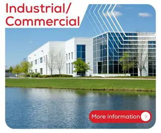 Modern white office building by a pond, labeled Industrial/Commercial. More Information button shown.