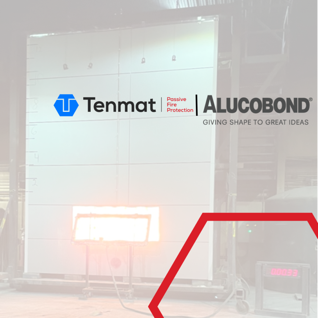 Large white panel with Tenmat and Alucobond logos, exposed to fire for a passive fire protection test.