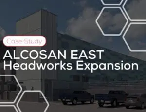 Modern building and parked trucks, with text: ALCOSAN EAST Headworks Expansion.