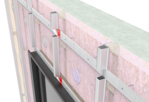 Cross-section of a wall with insulation, metal framing, and clips attached for facade installation.