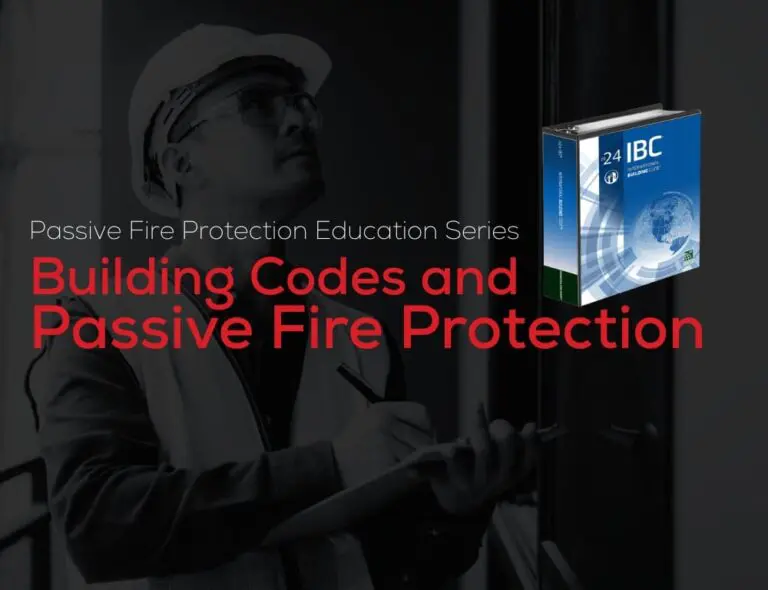 Worker in safety gear writes beside book titled Passive Fire Protection and Building Codes.