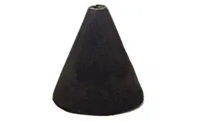 A single black incense cone rests on a white background, resembling minimalist décor elements often seen beneath a fire rated ceiling.