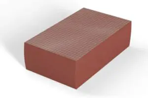 A reddish-brown rectangular block with a grid pattern on its top surface, commonly used in UL firestop systems, shown on a white background.