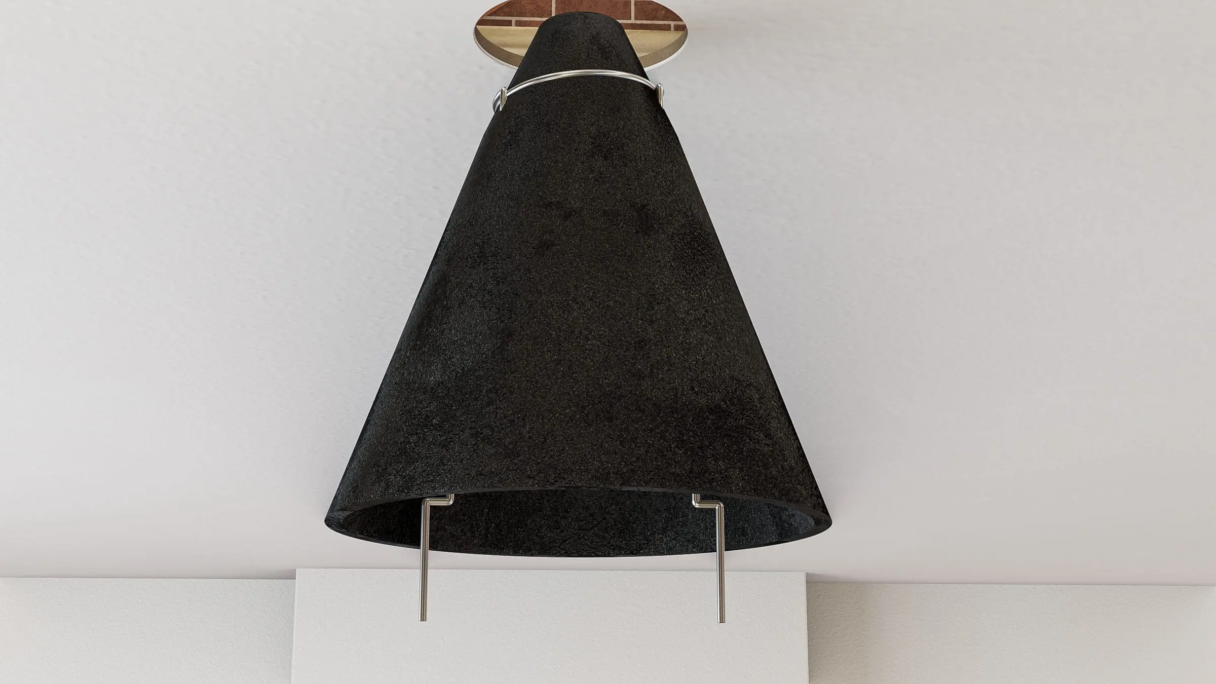 Black cone-shaped ceiling light with metal supports on a white ceiling.