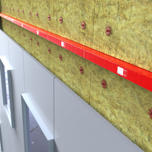 Close-up of a building facade featuring insulation panels and red metal horizontal support strips above windows, incorporating a fire barrier for enhanced safety.