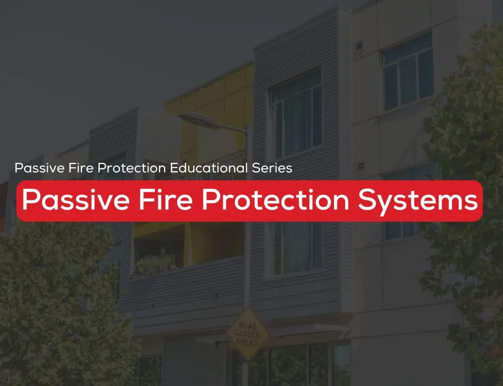 Modern building with a bold red sign: Passive Fire Protection Systems.