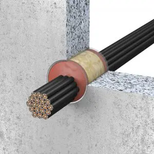 Cross-section of an electrical cable with multiple wires passing through a hole in a concrete wall, protected by UL firestop systems.