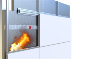 Flames behind a metal fire barrier door, partially closed in a modern building wall.