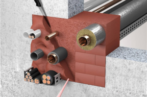 Illustration of various cables and pipes passing through a fireproof wall sealant in a concrete wall.