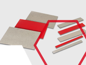 Beige and red rectangular sheets and strips arranged on a white background with red geometric lines.