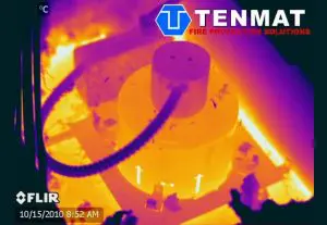 Thermal image of electrical equipment, showing heat distribution; Tenmat Fire Protection Solutions logo and an attic recessed light cover are visible.