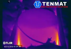 Infrared image of a hot object, featuring an attic recessed light cover, with TENMAT Fire Protection Solutions logo and date stamp in the corner.